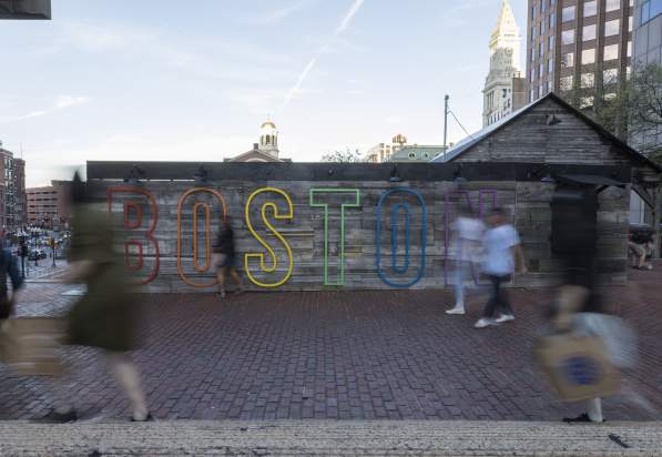 Boston sign over a wall outside City Hall Plaza