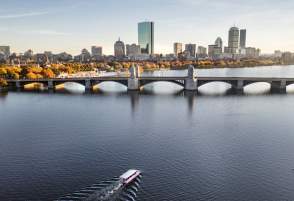 An aerial view of the Charles River with Boston in the background