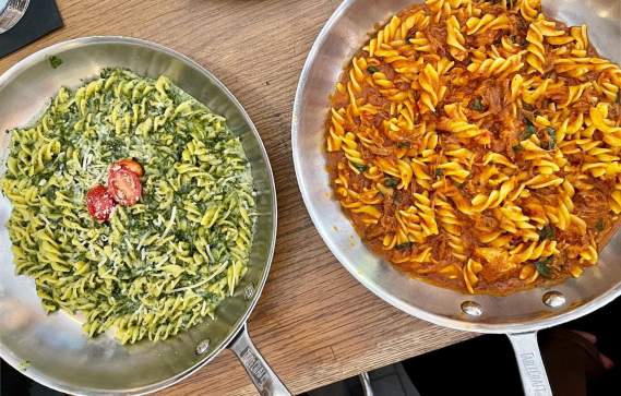 Two Italian dishes being served at Trattoria II Panino