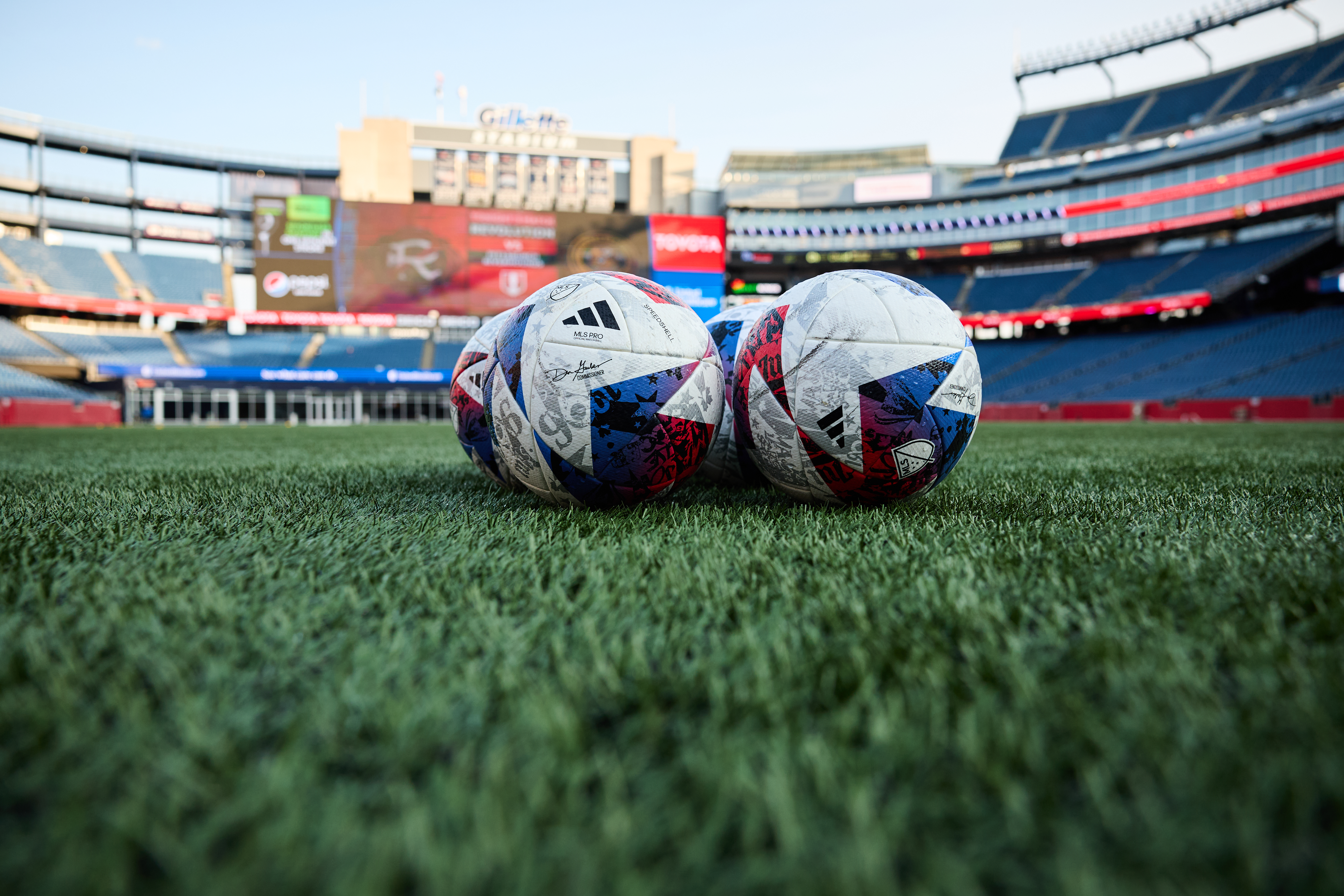 Soccer balls on the field at Boston Stadium