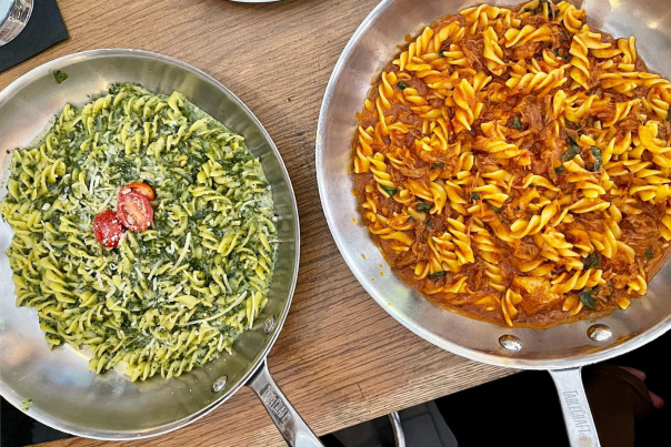 Two Italian dishes being served at Trattoria II Panino